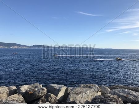 View From The Pier With Boats At The Distance In Sanxenxo Galicia Spain