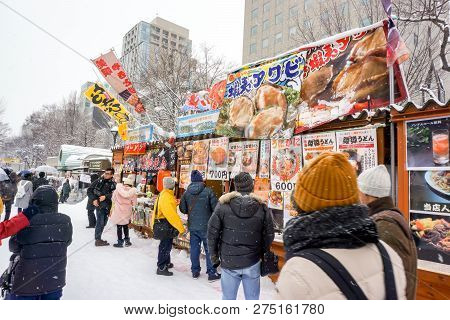 Supporo, Hokkaido, Japan 12 February 2018 : Booth Sell A Variety Of Food At The Snow Festival, It Ha