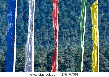 Garlands Of Colorful Buddhist Prayer Flags. Buddhist Prayer Religious Flags Waving In Wind On The Si