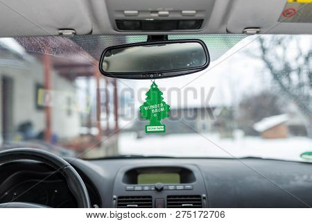 Miercurea Ciuc, Romania- 22 December 2018: Hanging Green Apple Wunder Baum Air Freshener On Car Inte