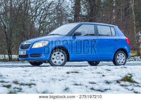 Blu Skoda Fabia To Street, Trees An Way. Winter, Travel Photo 2012.
