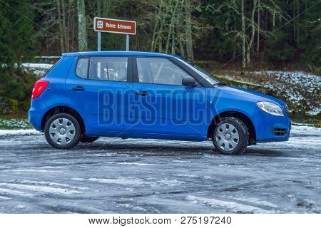 Blu Skoda Fabia To Street, Trees An Way. Winter, Travel Photo 2012.