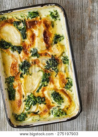 Close Up Of Rustic Golden Spinach Potato Gratin Dauphinois