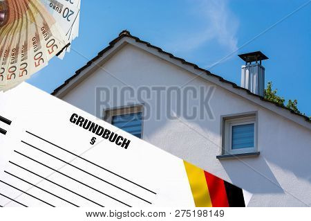 Gable Side Of A Multi-family House Of The 60s After The Modernization Against The Blue Sky. In The F