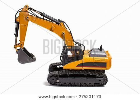 View Of R/c Model Excavator Racing Cars On A White Background. Free Time Children And Adults Concept