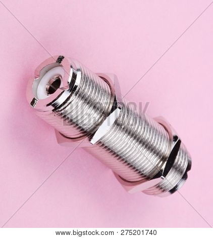 Radio Connector On Pink Background At Dry Sunny Summer Day