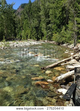 The Methow River Flows By Mazama In The Methow Valley, Washington. The Mountain Water Is Crystal Cle