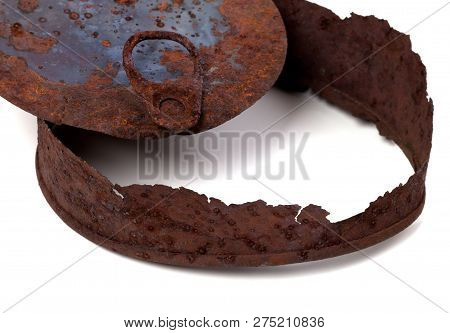 Part Of Old Old Rusty Tin Can Isolated On White Background
