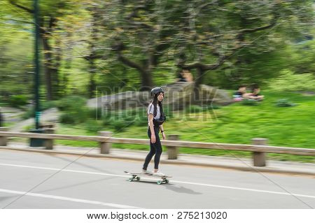 New York, Usa - May 5, 2018: Unidentified People Riding Skateboard In Central Park.
