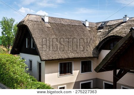 Traditional Thatched Roof From Reed, Sunny Summer Day