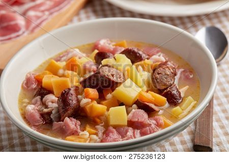 Traditional Irish dish Dublin coddle with sausages on a table
