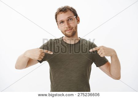Look Who Is Boss Here. Portrait Of Proud And Pleased Self-assured Handsome Male Entrepreneur In Glas