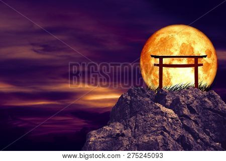 Blood Moon Back Torii Over Grass Stone And Rock Of Cliff