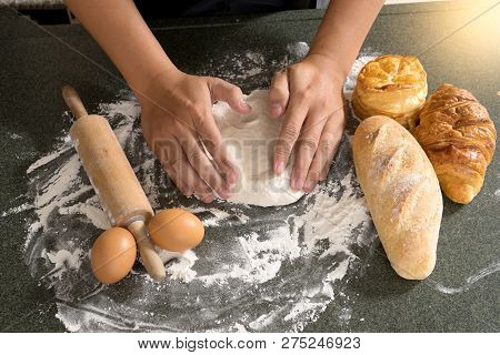 Man Hand Prepare Bakery Raw Material  For Raw Dough For Bread  Bake Or Cake
