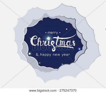 Lettering Merry Christmas And Happy New Year On The Night Sky Behind The Clouds With Shining Stars