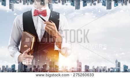 Double Exposure Of Confident And Young Businessman In Smart-casual Wear Smoking Pipe And Modern City