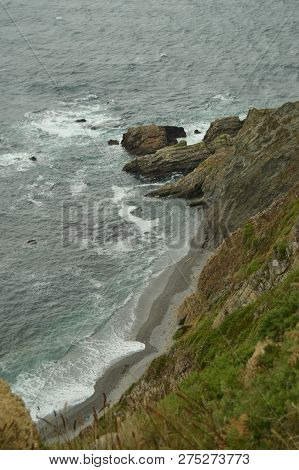 Beautiful Cliffs And Shore Of Stones In The Beach Of The Mills In Barcia. July 30, 2015. Beach Of Lo