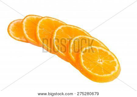 Slices Of The Mandarin On White Background. Top View