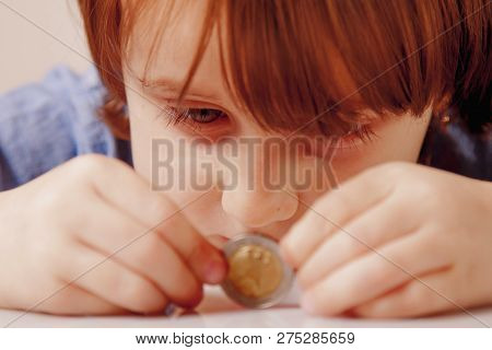 Coins Mobile Wallet Concept. Happy Cute Business Child Girl With Coints. Humorous Photo.