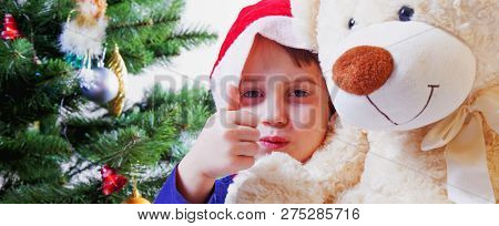 New Year Holiday Concept. Close Up Portrait Of Cutel Little Child Girl Playing With Taddy Bear.