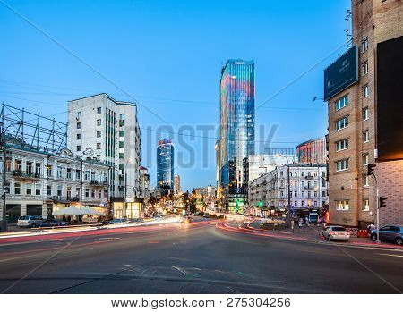 Cars Drive On Baseina Street.