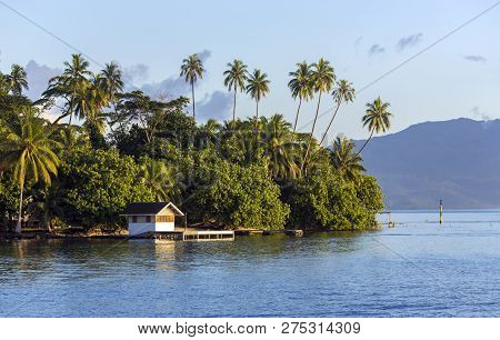 A Small Wooden Jetty In The Lagoon Near The Bora-bora Island In The Leeward Group Of The Society Isl