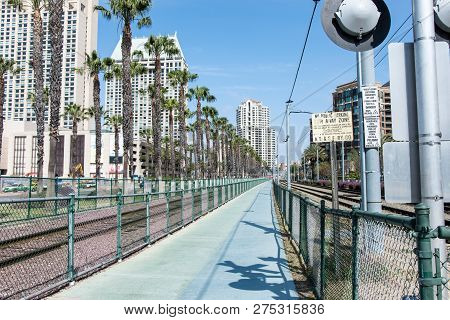 May 1 2016 - San Diego, Ca: Train Tracks For The San Diego Trolley As Well As Amtrak Passenger Train