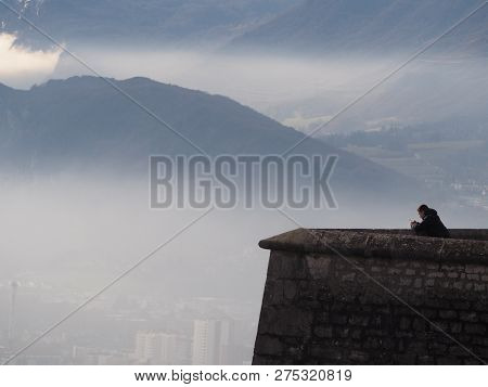 Grenoble, France - December 23, 2018: Photography Of Some People Admiring The View From La Bastille 