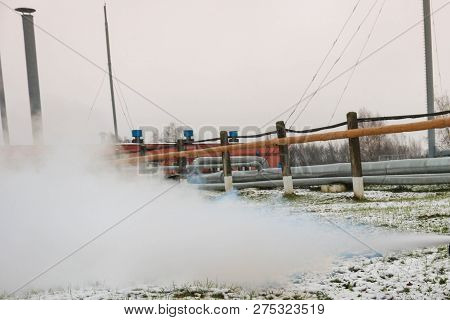 Pipe Rack With Pipes In Superheated High-pressure Steam At An Oil Refinery Petrochemical Chemical Pl