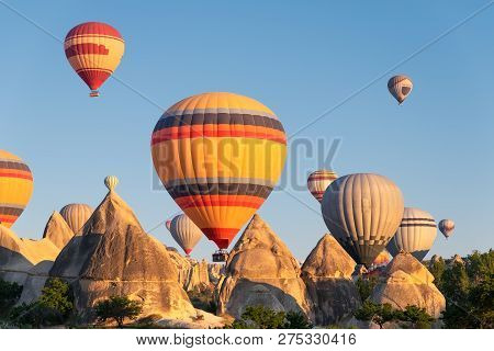 Airballoons In Turkey, Cappadocia. Travel And Leisure. Adventure In The Air. Concept And Idea Of Adv
