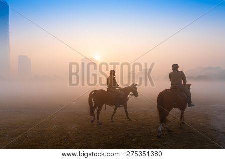 Kolkata, West Bengal, India - Hanuary 21st 2018 : Two Mounted Police Walking Thier Horses At Kolkata