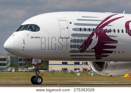 Farnborough, Uk - July 16, 2014: Airbus A350-941 Commercial Aircraft With A Hybrid Airbus/qatar Airw