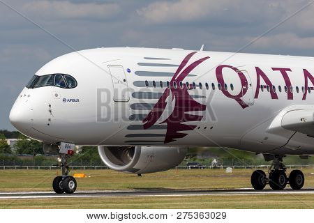 Farnborough, Uk - July 16, 2014: Airbus A350-941 Commercial Aircraft With A Hybrid Airbus/qatar Airw