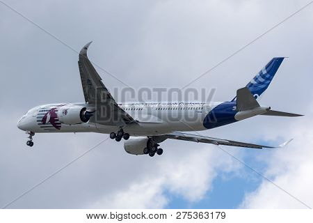 Farnborough, Uk - July 16, 2014: Airbus A350-941 Commercial Aircraft With A Hybrid Airbus/qatar Airw