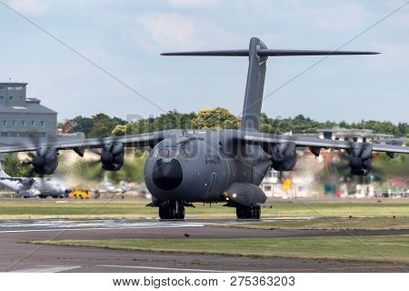 Farnborough, Uk - July 16, 2014: Airbus Defence And Space A400m Military Cargo Aircraft F-wwms.