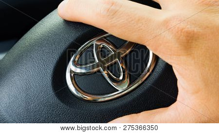 August 25, 2018. Krasnoyarsk. Russia. Toyota Logo In Male Hand
