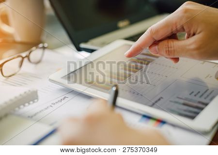 Businessman Analyzing Company Financial Economic Report. Concept Picture For Stock Market, Office, T