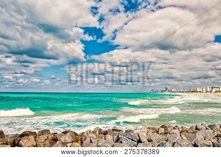 South Beach, Miami, Florida. View Of Amzing Color Sea With Cloudy Sky