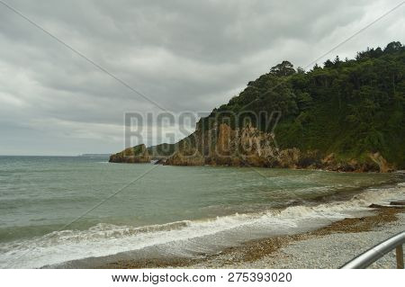 Beautiful Cliffs And Shore Of Stones In The Beach Of The Mills In Barcia. July 30, 2015. Beach Of Lo