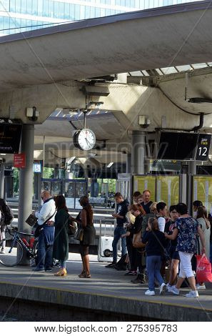 Platform and train view on Oslo central station. Oslo Central Station (Sentralstasjon) is main railway station in Oslo. June 17. 2018. Oslo,Norway