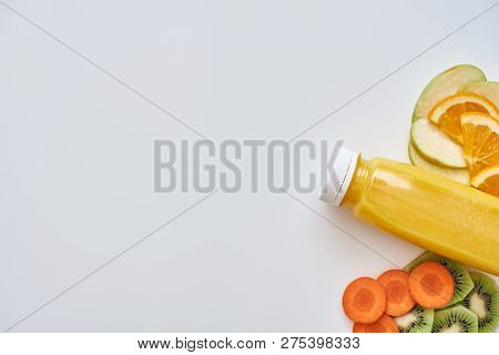 Low Callories Food. Fresh Orange Smoothie With Fruits Isolated In White Background