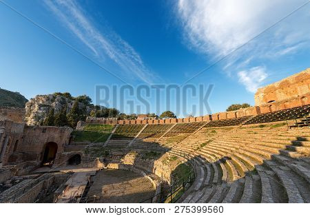 Ancient Greek Roman Theater At Sunset In Taormina Town, Messina, Sicily Island, Italy (ii Century Ad