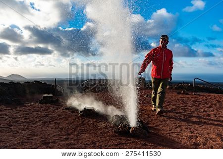 Lanzarote, Spain - Dec 13, 2018: Artificial Volcanic Geyser Demonstration In Timanfaya Volcanic Nati