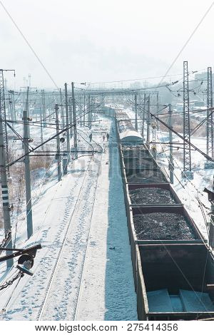 Rail Cars Loaded With Coal Transported From Nearby Mines To Power Plants In Winter