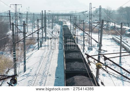 Rail Cars Loaded With Coal Transported From Nearby Mines To Power Plants In Winter