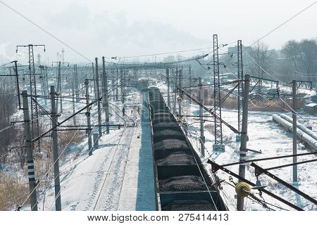 Rail Cars Loaded With Coal Transported From Nearby Mines To Power Plants In Winter
