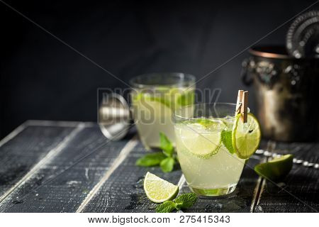 Lemonade Or Mojito Cocktail With Lemon And Mint, Cold Refreshing Drink Or Beverage With Ice