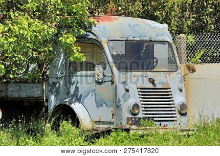 Old Abandoned Vintage French Truck Rusting In A Ghost Town