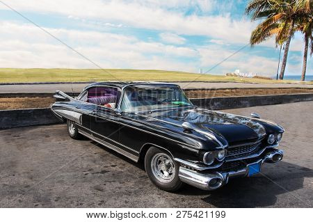 Havana, Cuba - Aug. 2017: Old Retro-mobile, Black Vintage Car, Enormous Big - Taxi In The Surburb Of