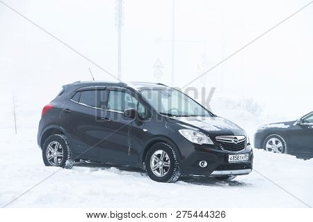 Novyy Urengoy, Russia - December 22, 2018: Motor Car Opel Mokka In The City Street During A Heavy Fr